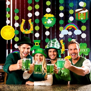 St. Patrick's Day party decorations set featuring green clovers and gold coins on a string