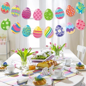 Colorful Easter egg banner garland with floral patterns hanging in a festive dining room