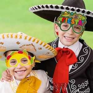 Kids wearing colorful Fiesta taco and sombrero party glasses for Mexican festival fun