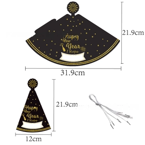 Flat lay showing assembly details of black and gold Happy New Year paper party hats
