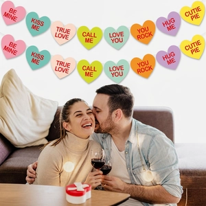 Colorful Valentine's heart banner with Love You and Be Mine text for party decoration