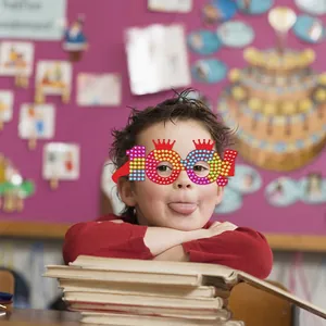 Funny 100 Days of School paper glasses for kids with red crowns and colorful polka dots