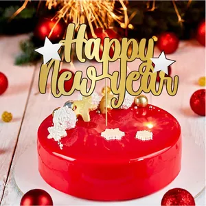 Golden mirror Happy New Year cake topper with stars on red festive cake base