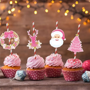 Pink Christmas cupcake toppers featuring reindeer and Santa Claus for festive party decor