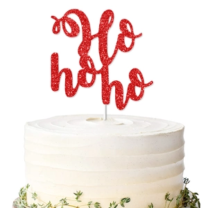 Red glitter Ho Ho Ho cake topper for Christmas party decoration on white cream cake