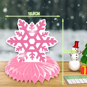 Macro view of pink snowflake honeycomb ornament showing dimensions 15.9cm x 16.9cm