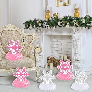 Close-up of glittery snowflake honeycomb centerpieces for Christmas party decorations