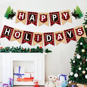 Red buffalo plaid Happy Holidays banner hung over a white fireplace with Christmas tree