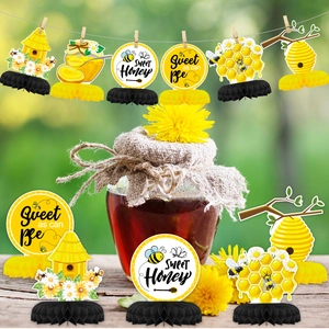 Bee theme party honeycomb centerpieces and hanging cards for baby shower table decor