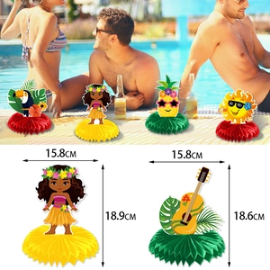 Hawaiian party honeycomb centerpieces featuring tropical summer motifs for table decoration