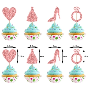 Pink glitter bachelorette cake toppers with heart, dress, shoe and ring shapes