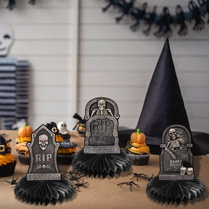 Set of three Halloween tombstone honeycomb centerpieces with skeleton and RIP designs