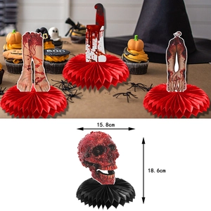 Halloween honeycomb centerpiece set with skull, severed limbs and bloody knife props