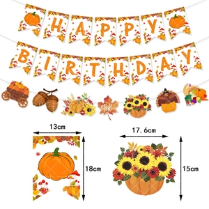 Detail view of fall party banner with pumpkin and maple leaf patterns showing dimensions