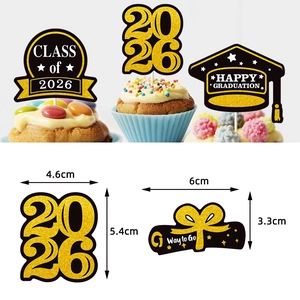 Class of 2026 graduation cake toppers in black and gold glitter with cupcake display