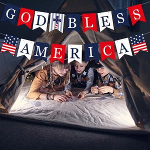 God Bless America patriotic banner with stars and stripes hanging on a children's play tent