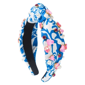 Blue tie-dye fabric headband with crystal rhinestones and pearls in a twisted knot style