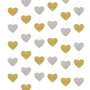 Glittery heart banner in gold and silver for Valentine's Day and wedding party decoration