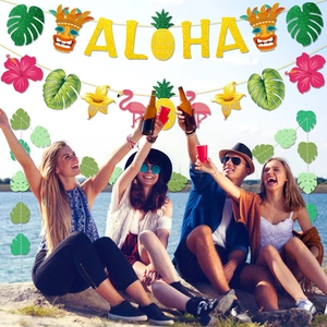 Hawaiian party decoration set with Aloha glitter banner, flamingos and tropical palm leaves
