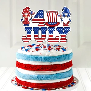 4th of July Independence Day cake topper with gnome design on a patriotic layered cake