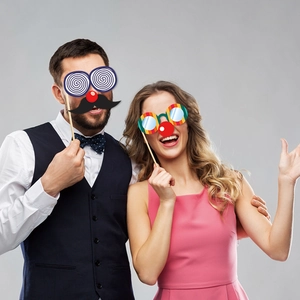 41-piece carnival party photo booth props with circus themed masks and wooden sticks