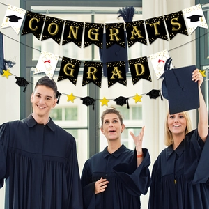 Congrats Grad banner set with gold lettering and glitter graduation cap decorations