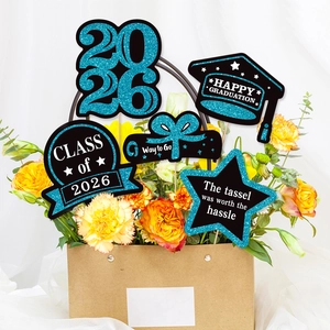 Class of 2026 graduation party floral picks in blue and black glitter for centerpieces