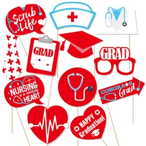 Nursing graduation party photo booth props with stethoscope and scrub life signs
