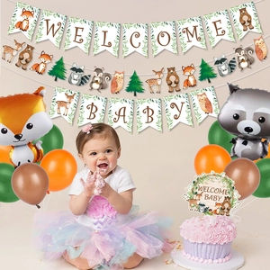 Jungle animal theme baby shower decorations with fox and raccoon balloons and welcome banner