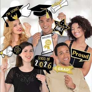 25-piece Class of 2026 graduation party photo booth props with black and gold glitter