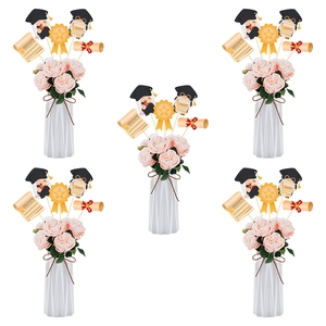 Graduation gnome flower kit with graduate cap gnome and roses in a striped white vase