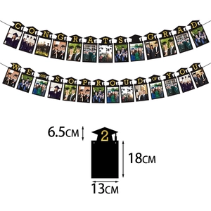 Congrats Grad banner with black graduation cap photo frames and gold lettering party decor