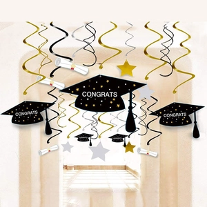 Graduation party hanging swirls set with black mortarboard caps and gold star pendants