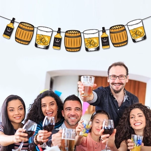Beer and whiskey themed party banner with bottle and barrel cutout decorations