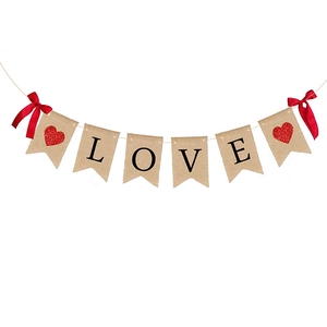 Jute burlap Love banner with red glitter hearts and bows for Valentine's Day party decor