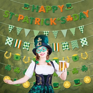 Saint Patrick's Day banner set with green clovers and gold coins party decorations