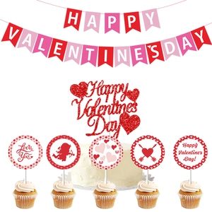 Detail of red glitter Happy Valentine's Day cake toppers and banner set on white background