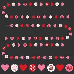 Detail view of Valentine's XOXO heart garland banner with love themed paper cutouts