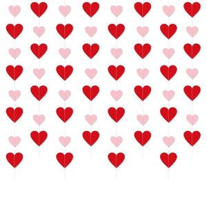 Detailed view of red and pink paper heart garland for Valentine's Day party decoration