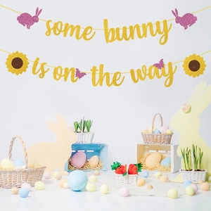 Golden glitter 'some bunny is on the way' banner with pink rabbits and sunflowers