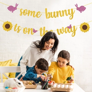 Some Bunny is on the Way glitter banner with pink bunnies and flowers for Easter party