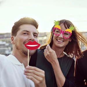 Funny Hawaiian party photo booth props with pineapple glasses and red lips shapes