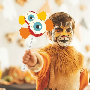 Halloween eyeball handheld photo props held by child for spooky party decoration