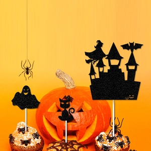 Black glitter Halloween cupcake toppers featuring ghosts and bats on a party background