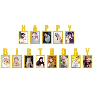 Close-up of golden glitter birthday photo banner with 13 frames for baby growth milestone