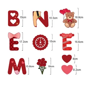 Valentine's Day banner decorations with be mine letters and teddy bear cutout for party