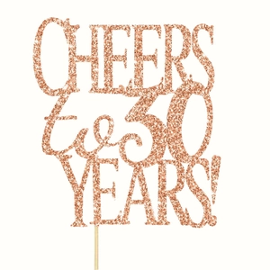 Detail of rose gold glitter topper with Cheers to 30 Years artistic lettering