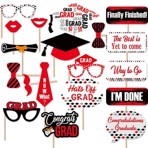 Funny graduation party photo booth props kit with bachelor caps, glasses and speech bubbles