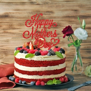 Sparkly red Happy Mother's Day cake topper with heart on a velvet berry cake