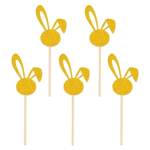 Detail view of five glittery gold bunny cupcake toppers for Easter party cake decorations
